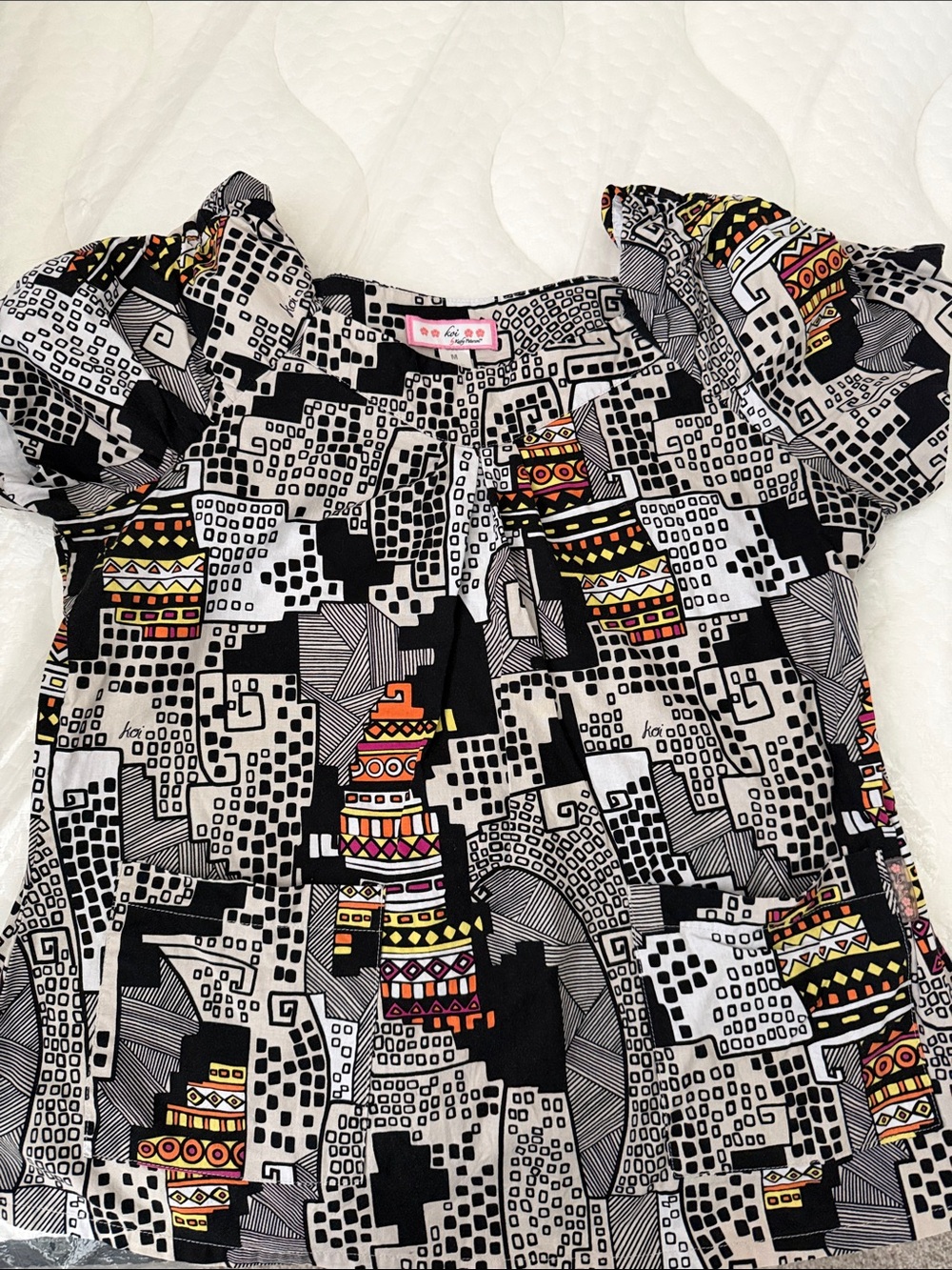 koi Black & White Geometric Print Blouse with Colorful Accents